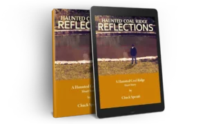 Haunted Coal Ridge #2 Reflections image of tablet and book covers.