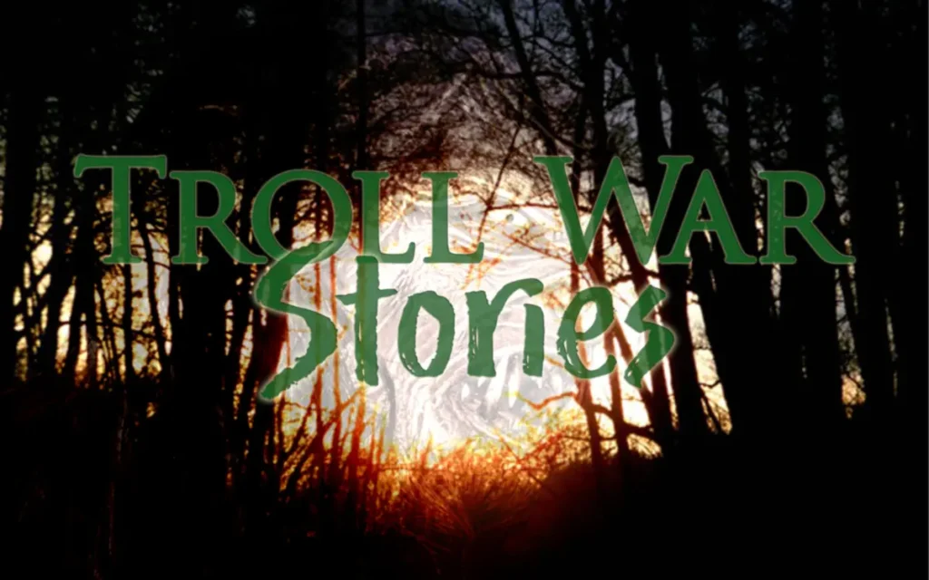 Writing Distracted Troll War Stories title card with image of troll superimposed over the light shining between the trees.